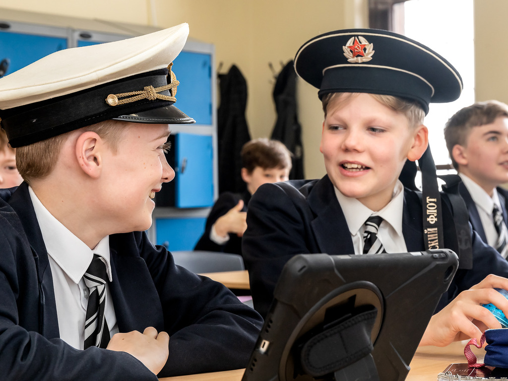 Senior Boys using iPads to assist language learning
