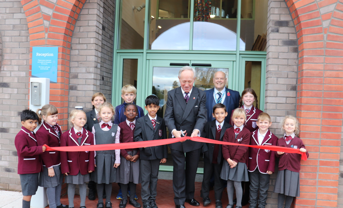 Chair of Governors, Sir Michael Snyder, the Headmaster of the Preparatory School, Jason Whiskerd, and members of the School council