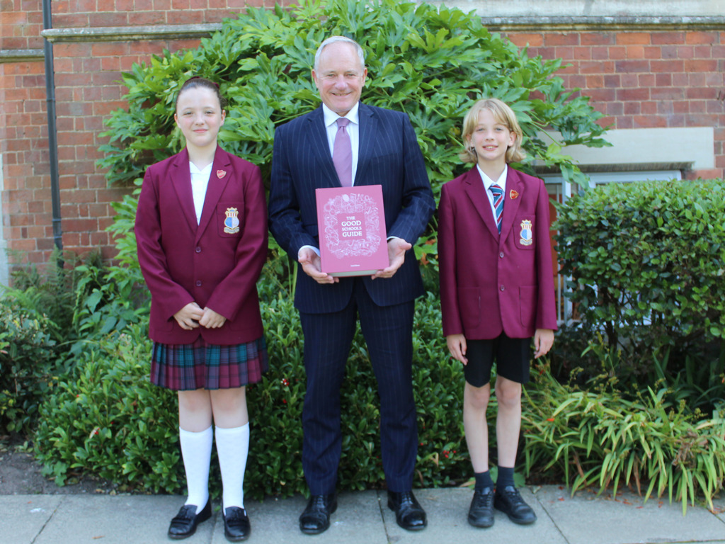 Headmaster, Rob Duigan with Head Girl, Lily Bryson and Head Boy, Aaron Anderson