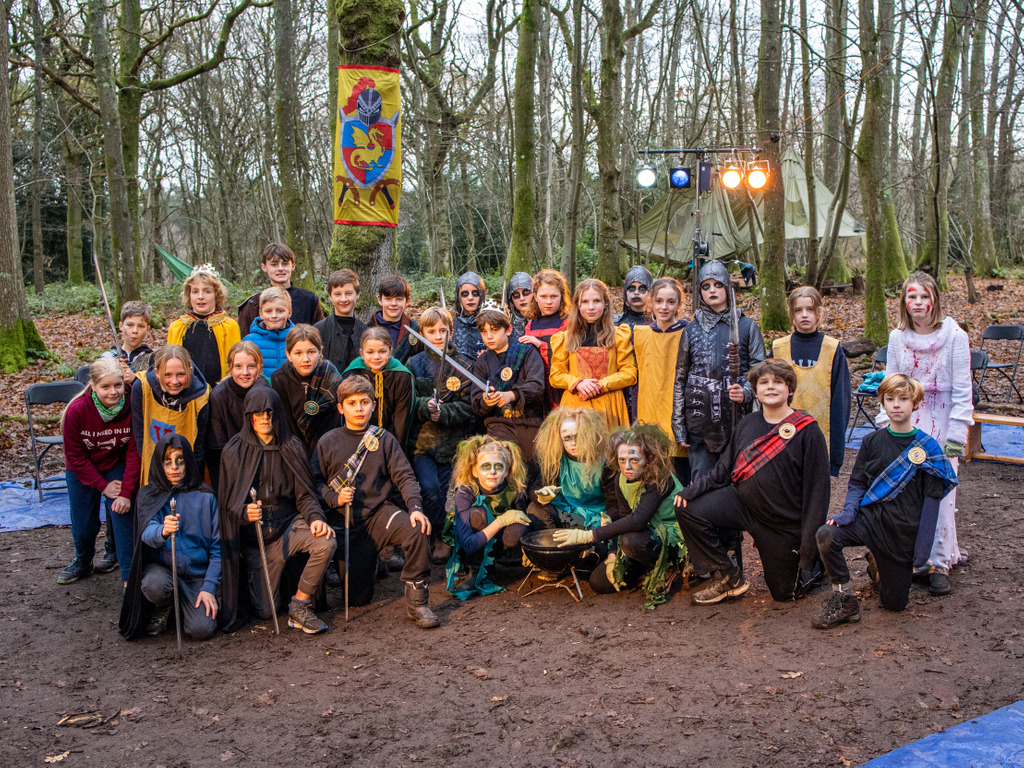 Year 7 at Highfield and Brookham Schools perform Macbeth in their woods.