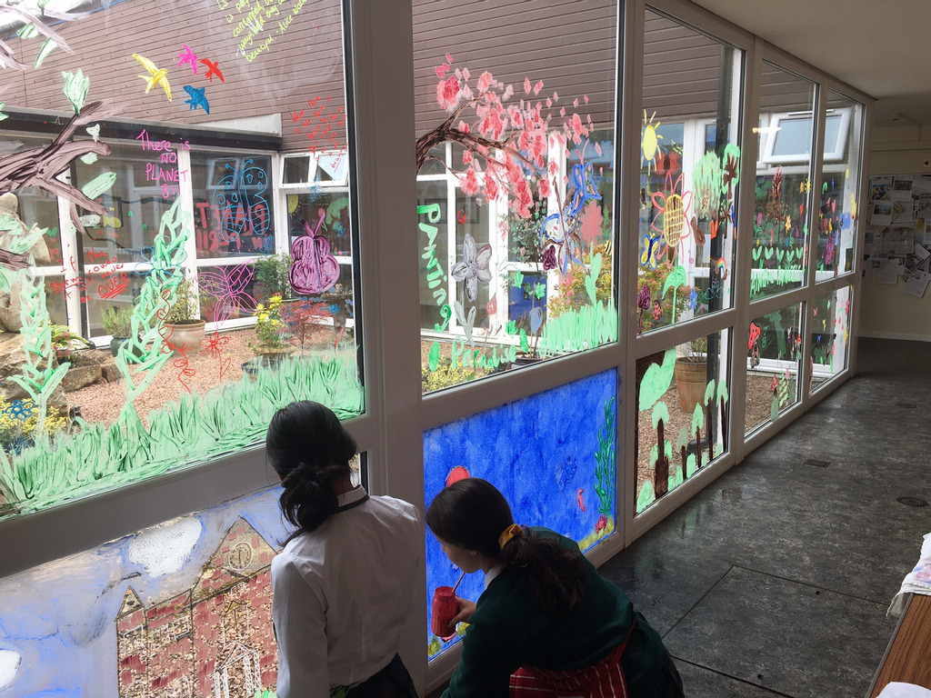 Pupils at Kilgraston School adding to the environmental mural