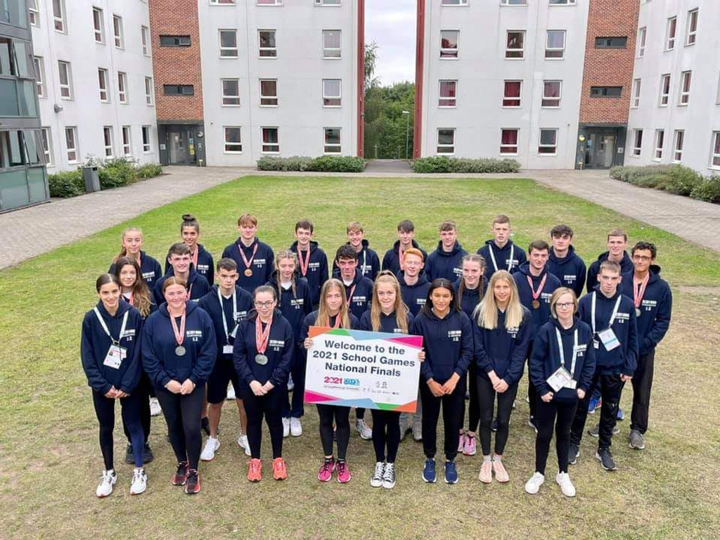 Freya Howgate, to the left of the banner, and members of Team Scotland at the School Games National Finals in Loughborough September 2021