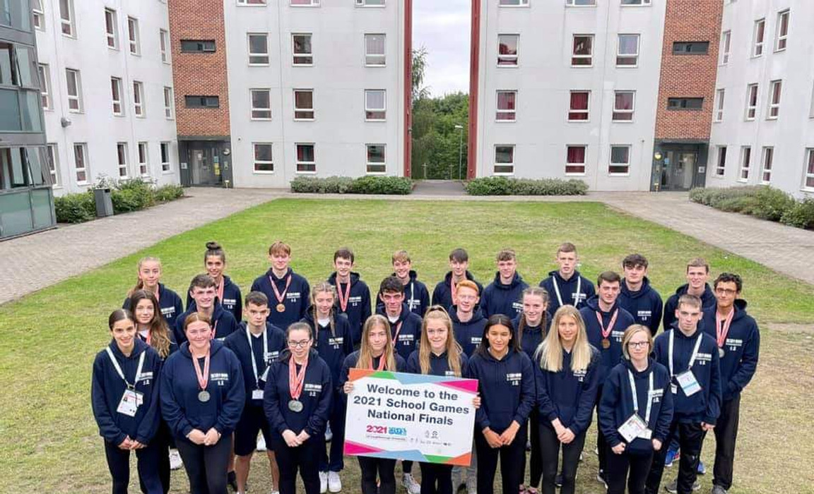 Freya Howgate, to the left of the banner, and members of Team Scotland at the School Games National Finals in Loughborough September 2021