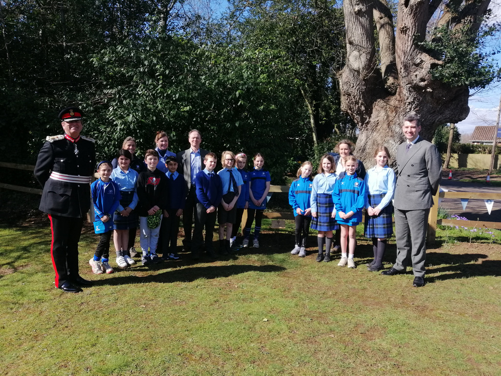 The Lord Lieutenant of Surrey (far left) visited Longacre School in Shamley Green, Surrey for the opening of the school's Platinum Jubilee hedge.