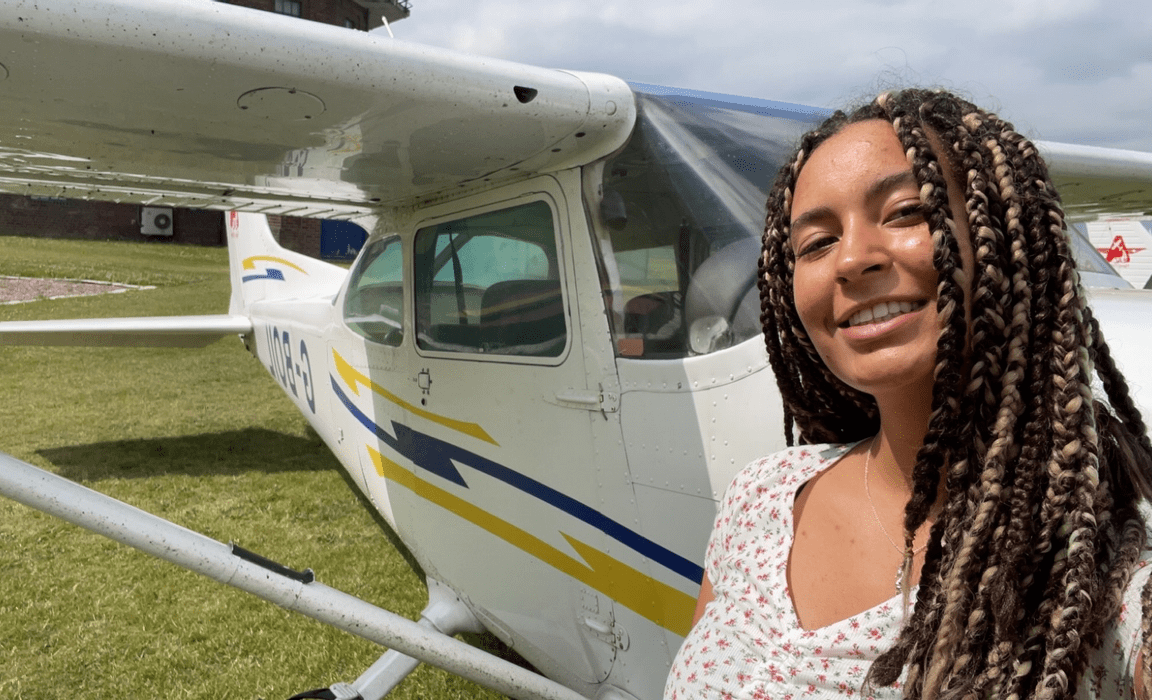 Hannah with the plane she flew in on her first solo flight
