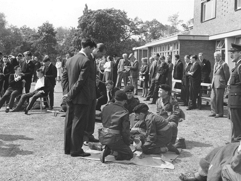 Prince Philip chattng with CCF Cadets on a visit to The Leys