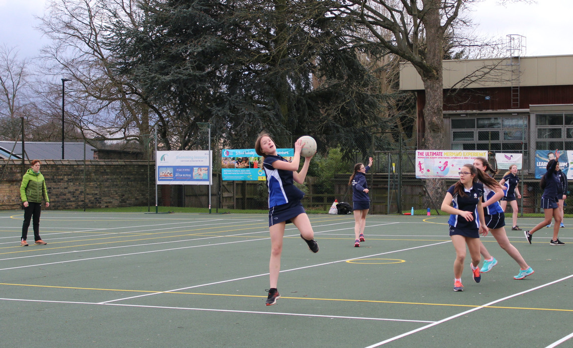 Mount girls practising covid-safe Netball drills
