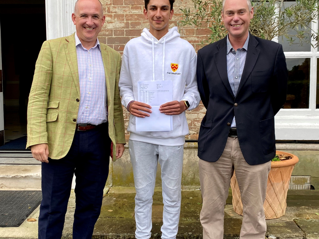 Ollie Rae with The Head Master and Deputy Head Academic